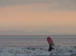 SX03511 Surfer in surf at Ogmore by Sea.jpg